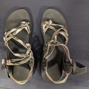 Green and tan Chacos